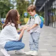 Parent jonglant entre travail et contraintes scolaires du quotidien