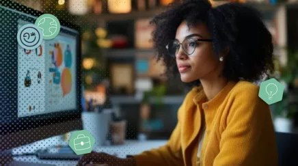 Responsable RH analysant une fiche de poste détaillée sur son écran, entouré de graphiques et tableaux de compétences.