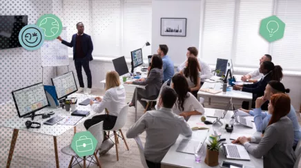 Collaborateurs en train de suivre une formation